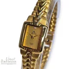 ASTRON 5071-9 női karóra, ékszeróra arany színű fém tok és csat, arany színű számlap, keményített ásványüveg, svájci szerkezet, quartz szerkezet, cseppmentes vízállóság