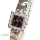 ASTRON 5113-1 női karóra, gyémánt köves ezüst színű fém tok, ezüst színű fémcsat, fekete számlap, keményített ásványüveg, quartz szerkezet, cseppmentes vízállóság