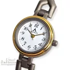 ASTRON 5128-0 női karóra, ékszeróra, bicolor titánium tok,  titánium csat, fehér színű számlap, keményített ásványüveg, quartz szerkezet, cseppmentes vízállóság