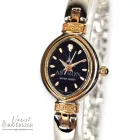 ASTRON 5161-1 női karóra, bicolor színű nemesacél tok, bicolor nemesacél csat, fekete színű számlap, keményített ásványüveg, svájci szerkezet, quartz szerkezet, cseppmentes vízállóság