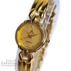 ASTRON 5071-9 női karóra, ékszeróra arany színű fém tok és csat, arany színű számlap, keményített ásványüveg, svájci szerkezet, quartz szerkezet, cseppmentes vízállóság