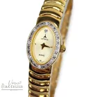 ASTRON 5244-9 női karóra, arany színű nemesacél tok, arany színű fémcsat, arany színű számlap, keményített ásványüveg, quartz szerkezet, cseppmentes vízállóság