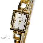 ASTRON 5609-8 női karóra, arany színű nemesacél tok, arany színű fémcsat,pezsgő színű számlap, keményített ásványüveg, svájci szerkezet, quartz szerkezet, cseppmentes vízállóság