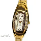 ASTRON 5708-6 női karóra, arany színű nemesacél tok, arany színű fémcsat, arany színű számlap, keményített ásványüveg, quartz szerkezet, cseppmentes vízállóság