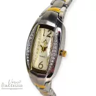 ASTRON 5708-9 női karóra, bicolor fém tok, bicolor fémcsat, pezsgő színű számlap, keményített ásványüveg, quartz szerkezet, cseppmentes vízállóság, dátum kijelzés