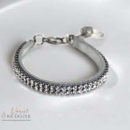 EZÜST SZÍNŰ BŐR KARKÖTŐ FEHÉR SZÍNŰ SWAROVSKI KÖVEKKEL